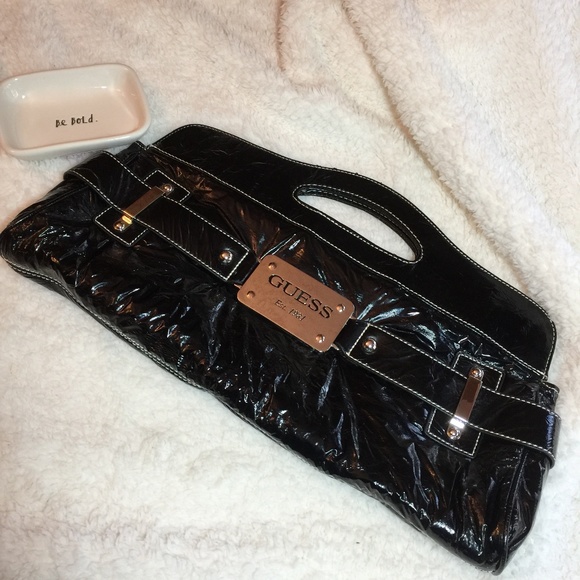 Guess Handbags - Guess Unusual Edgy Black Clutch